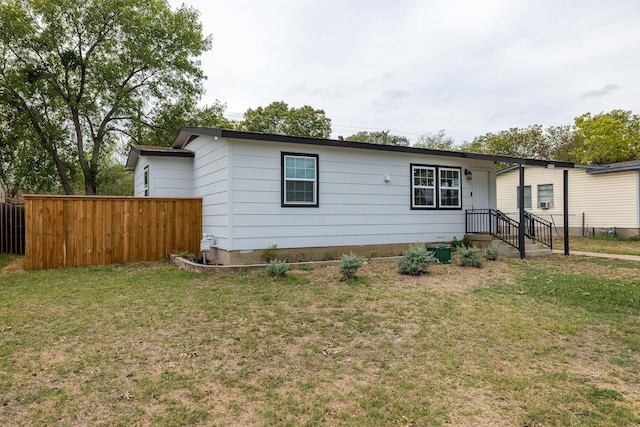 view of front of home featuring a front lawn