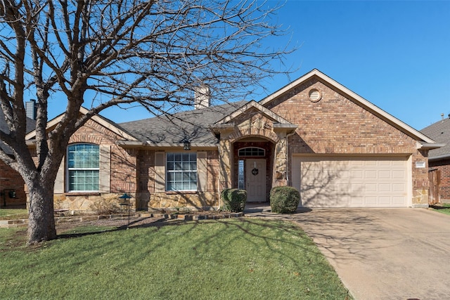 ranch-style home featuring concrete driveway, a chimney, an attached garage, a front yard, and brick siding