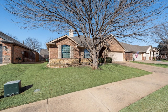 ranch-style house with concrete driveway, a chimney, an attached garage, a front lawn, and brick siding