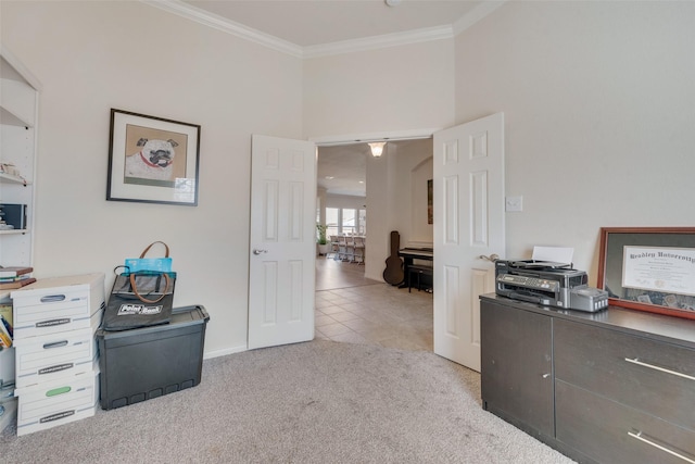 carpeted home office with baseboards, ornamental molding, and tile patterned floors