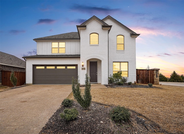 view of front of property featuring a garage