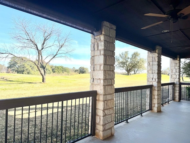 exterior space featuring ceiling fan