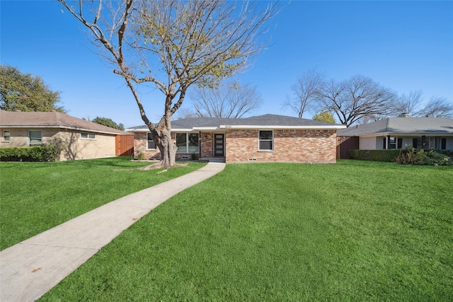 single story home featuring a front lawn