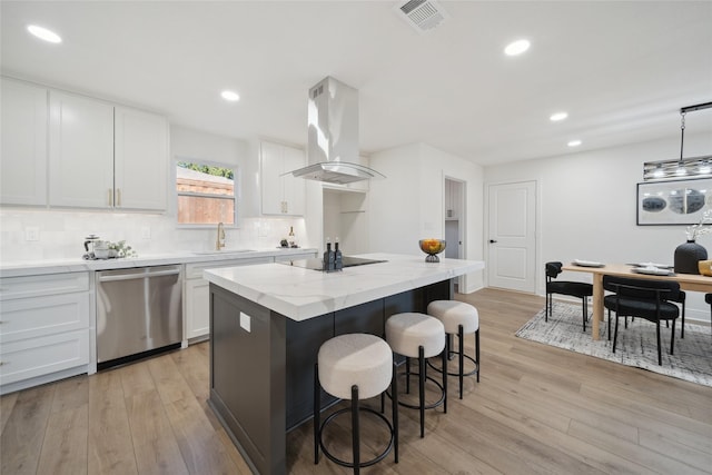 kitchen with a kitchen island, pendant lighting, island range hood, white cabinetry, and dishwasher