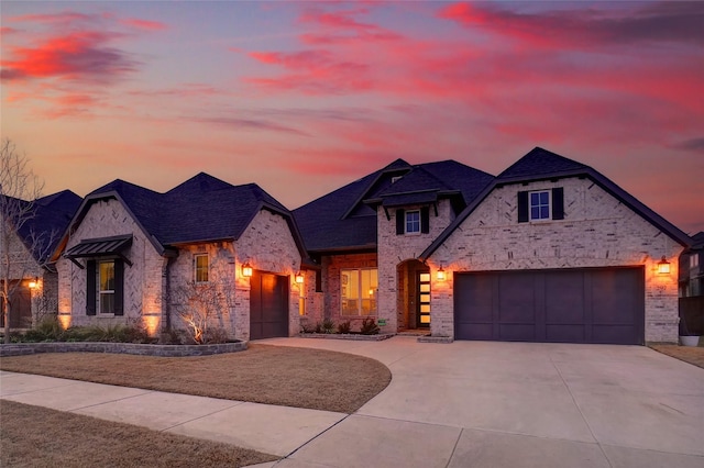 view of front of home with a garage