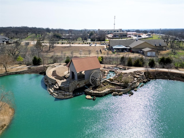 drone / aerial view with a water view