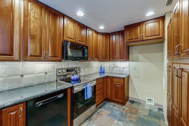 kitchen with tasteful backsplash, dark stone countertops, and black appliances