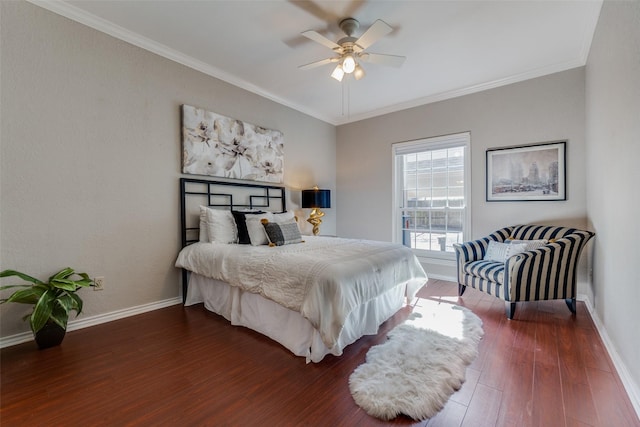 bedroom featuring dark wood-type flooring, ceiling fan, and crown molding