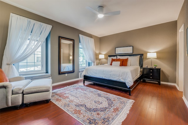 bedroom featuring wood-type flooring and ceiling fan