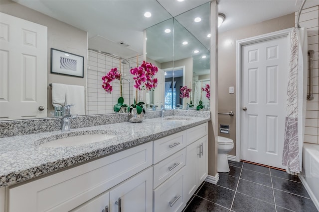 full bathroom with tile patterned flooring, vanity, shower / tub combo with curtain, and toilet