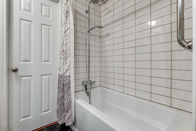 bathroom featuring shower / tub combo with curtain