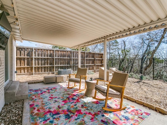 view of patio / terrace featuring outdoor lounge area and a fenced backyard