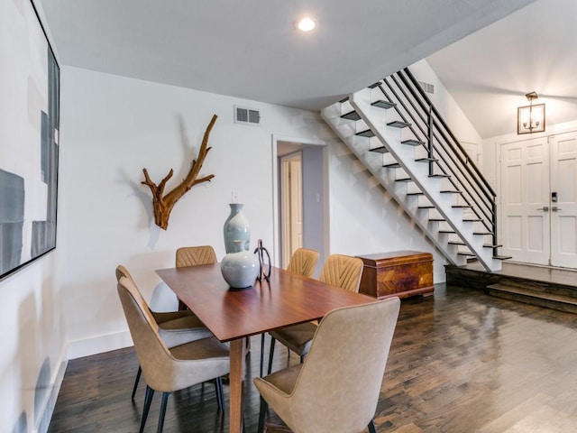 dining space featuring recessed lighting, wood finished floors, visible vents, baseboards, and stairway