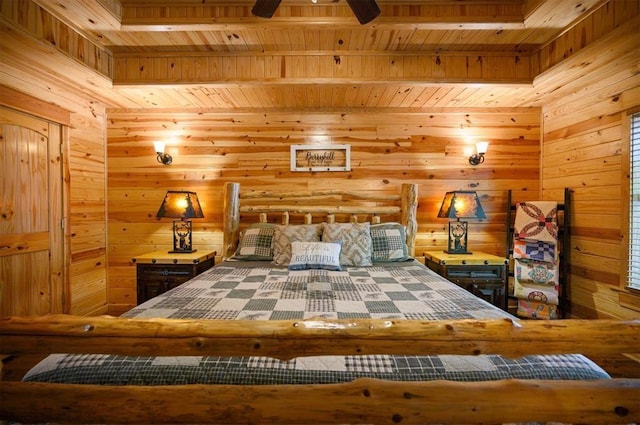 bedroom featuring wooden walls