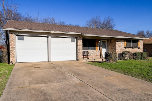 single story home with brick siding, roof with shingles, an attached garage, driveway, and a front lawn