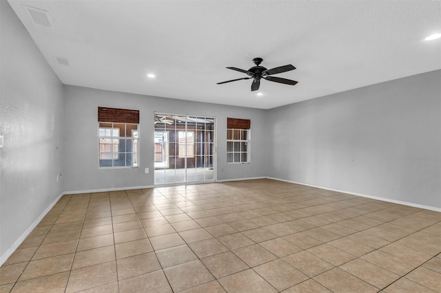 1308 Abbott Dr, Irving, TX 75060 - unfurnished room featuring a ceiling fan, recessed lighting, baseboards, and light tile patterned floors