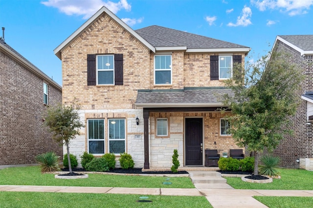 front facade with a front lawn