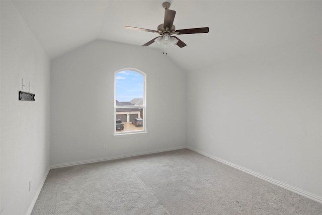 bonus room with vaulted ceiling, light carpet, and ceiling fan