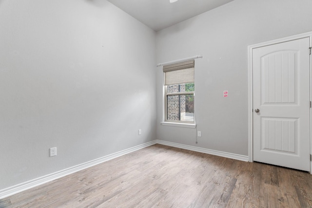 spare room featuring hardwood / wood-style flooring