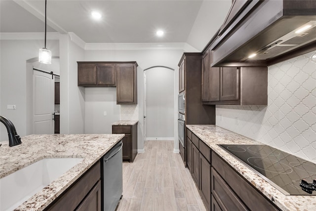 3915 Southern Oaks Dr, Royse City, TX 75189 - kitchen featuring wall chimney exhaust hood, a sink, stainless steel appliances, dark brown cabinetry, and light stone counters