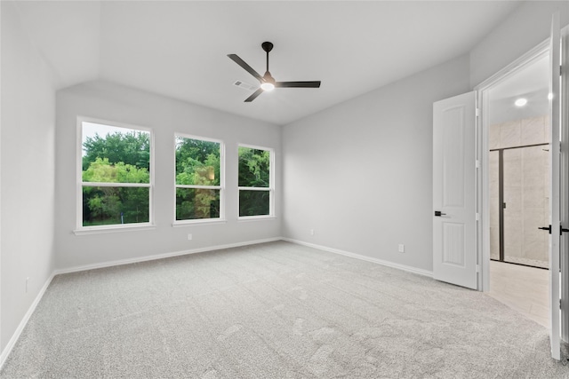 3915 Southern Oaks Dr, Royse City, TX 75189 - unfurnished bedroom with carpet, baseboards, vaulted ceiling, and a ceiling fan