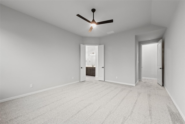 3915 Southern Oaks Dr, Royse City, TX 75189 - unfurnished bedroom featuring light carpet, baseboards, ensuite bathroom, and a ceiling fan