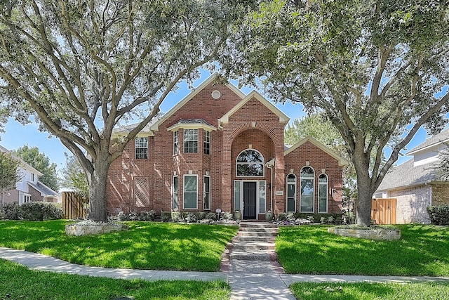 view of front property with a front lawn