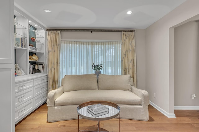 sitting room with light hardwood / wood-style floors