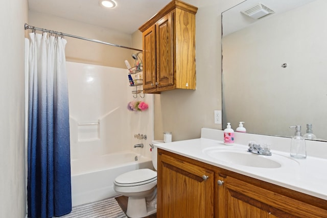 full bathroom with vanity, shower / bath combination with curtain, and toilet