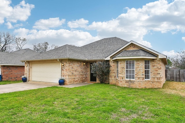 ranch-style house featuring a garage and a front yard