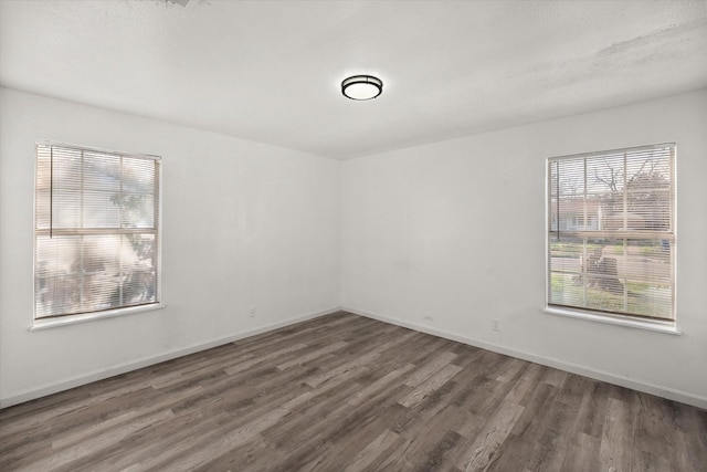2717 Eagle Dr, Dallas, TX 75216 - unfurnished room with dark hardwood / wood-style flooring