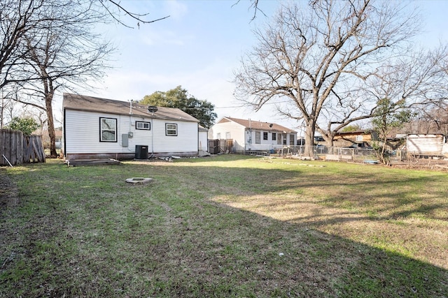 2717 Eagle Dr, Dallas, TX 75216 - view of yard with central AC unit and a fire pit