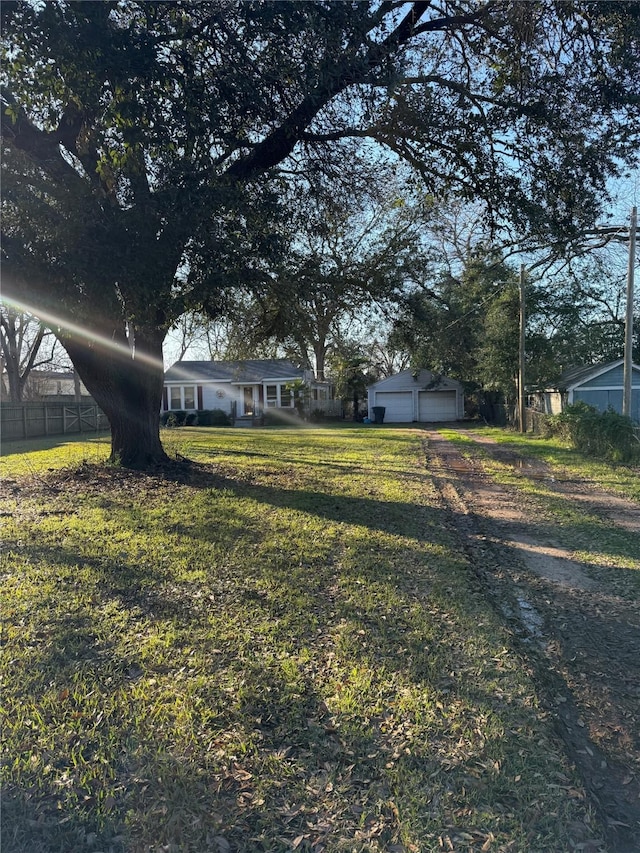 view of yard featuring a garage