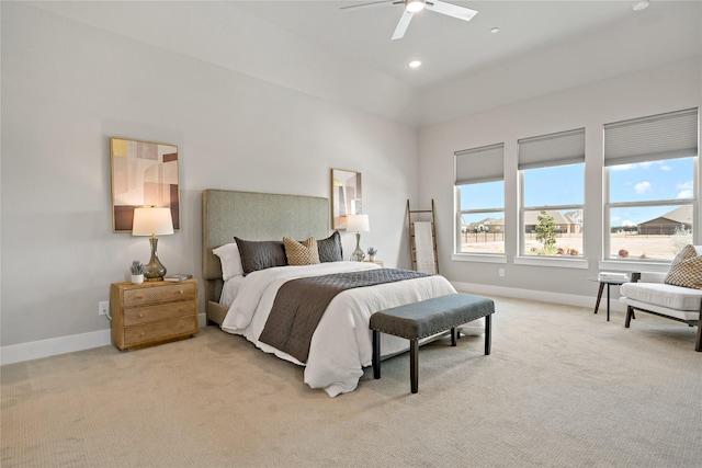 bedroom featuring recessed lighting, baseboards, light colored carpet, and ceiling fan