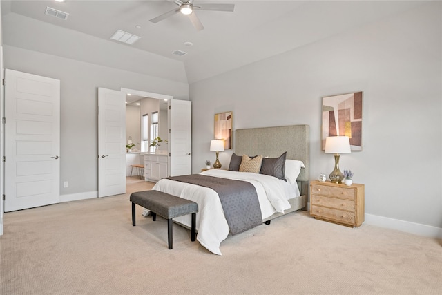 bedroom with visible vents, baseboards, light colored carpet, and vaulted ceiling