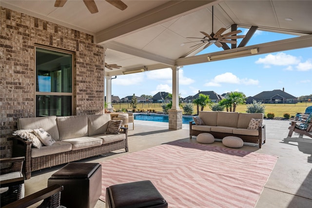 view of patio with a fenced in pool, outdoor lounge area, and fence