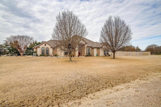 view of front of home with a front yard