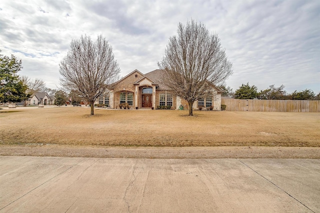 view of front of home with a front yard