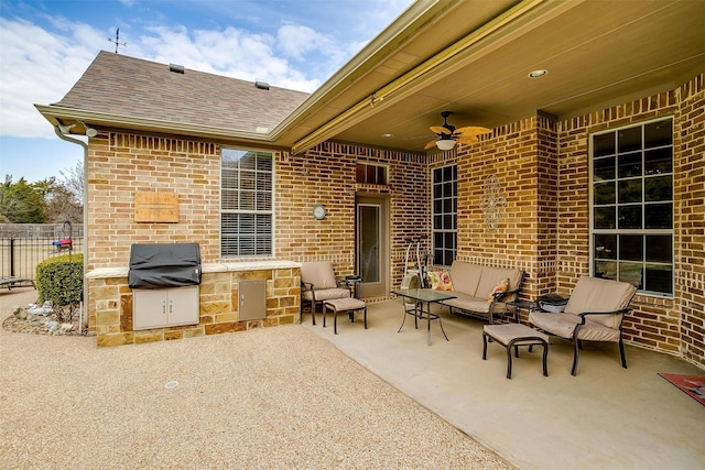 view of patio with ceiling fan and grilling area