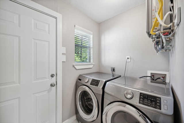 laundry area with washer and clothes dryer