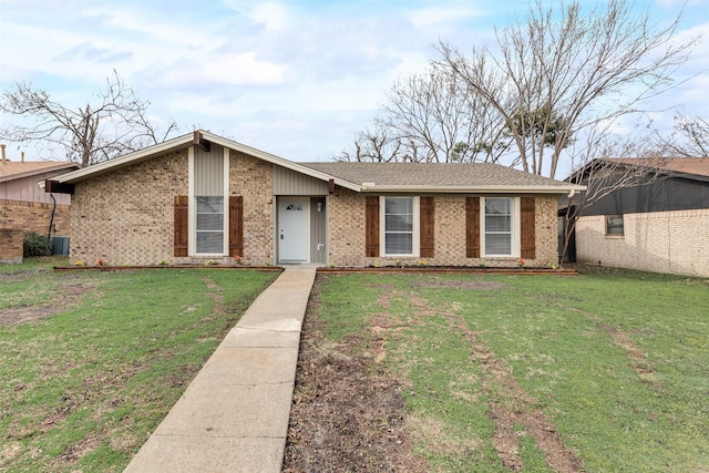 ranch-style house featuring a front lawn