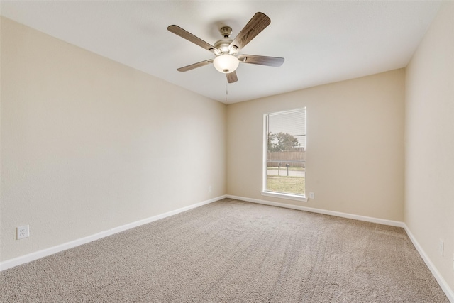 unfurnished room featuring carpet flooring and ceiling fan