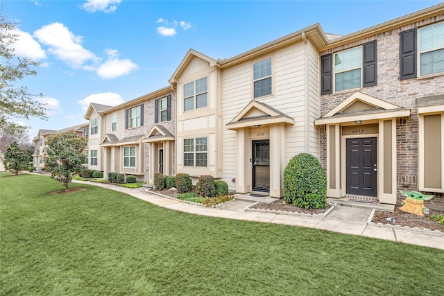 view of property with a front yard