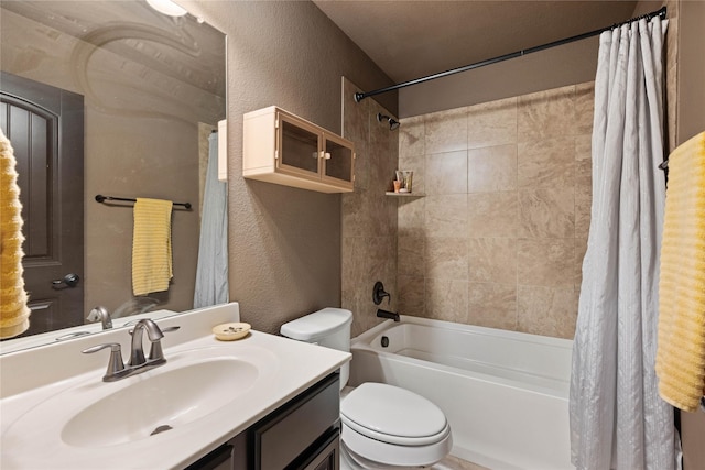 full bathroom with vanity, toilet, and shower / bath combo