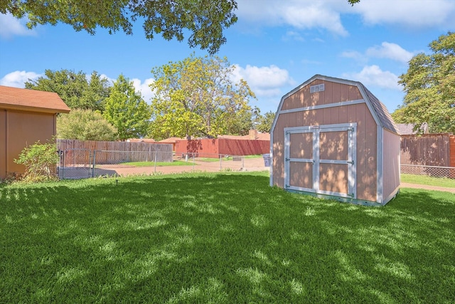 view of yard with a storage unit