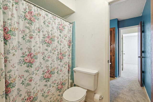 bathroom featuring shower / tub combo, a textured ceiling, and toilet