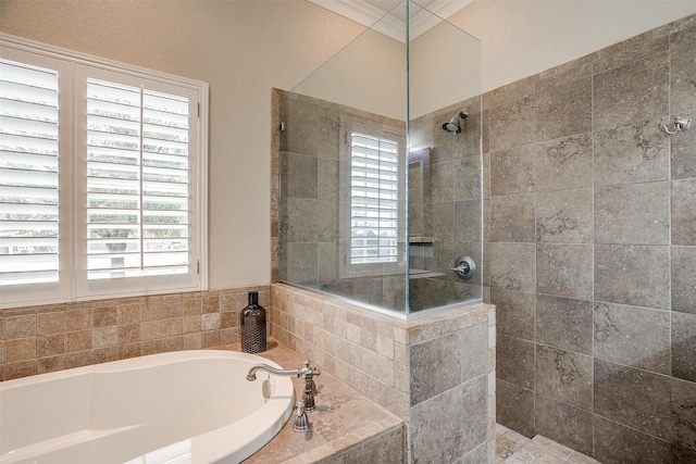 bathroom with a garden tub, a walk in shower, and crown molding