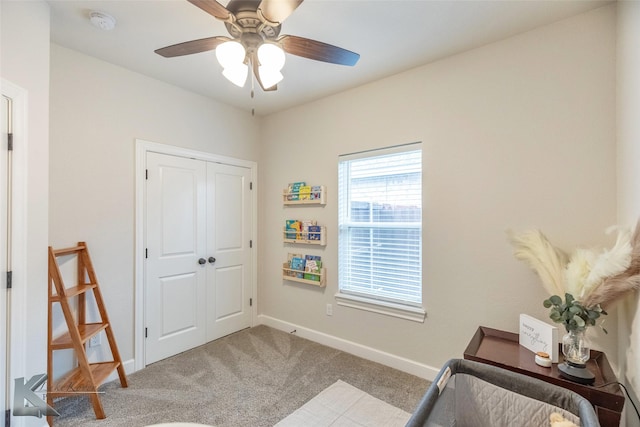 interior space featuring ceiling fan