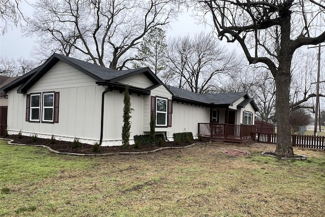 exterior space featuring a yard and a deck