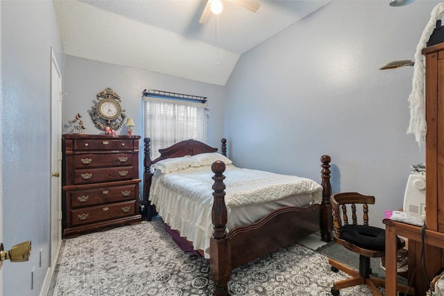 carpeted bedroom with ceiling fan and lofted ceiling